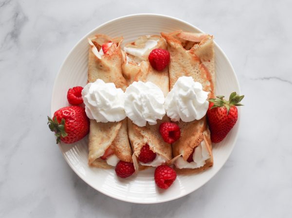 strawberry and banana on white ceramic plate