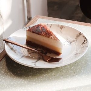 sliced cake on white ceramic plate