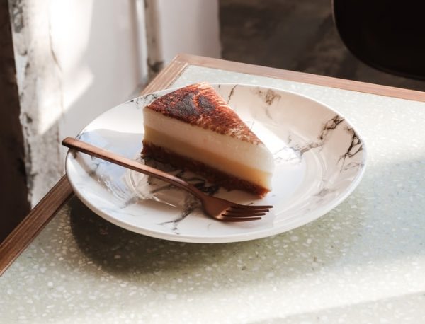 sliced cake on white ceramic plate